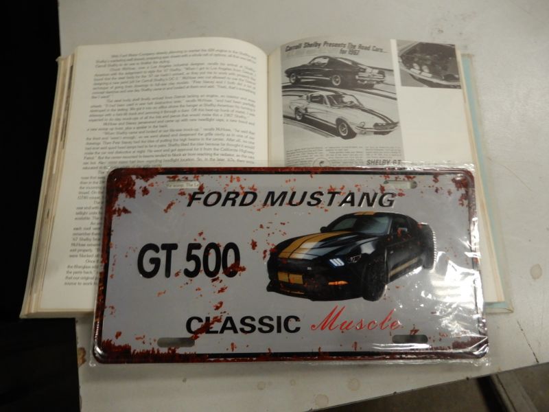 BOOK & TIN SIGN