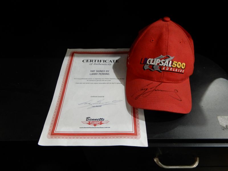 CLIPSAL CAP SIGNED LARRY PERKINS